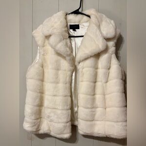 White fur vest